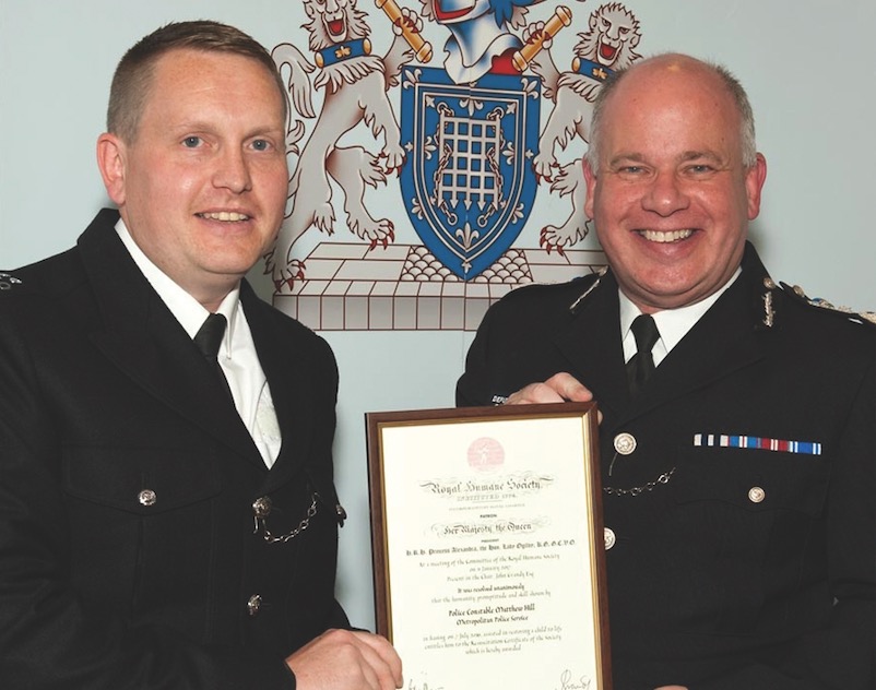 Police honour for officer who helped save choking two-year-old girl PC Matthew Hill and Deputy Commissioner Craig Mackey