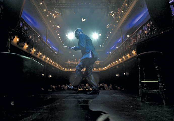 Suggs on stage reverse