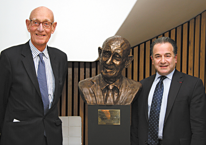 The kidney transplant surgeon with a passion for carving busts Nadey Hakim right and Professor Roger Williams