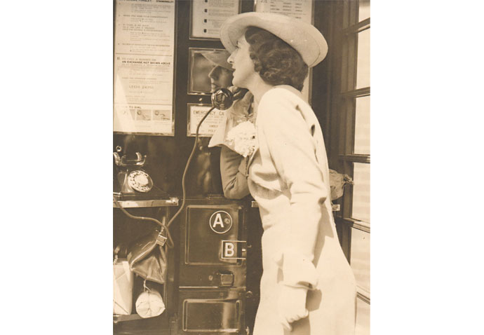 Woman in phone box