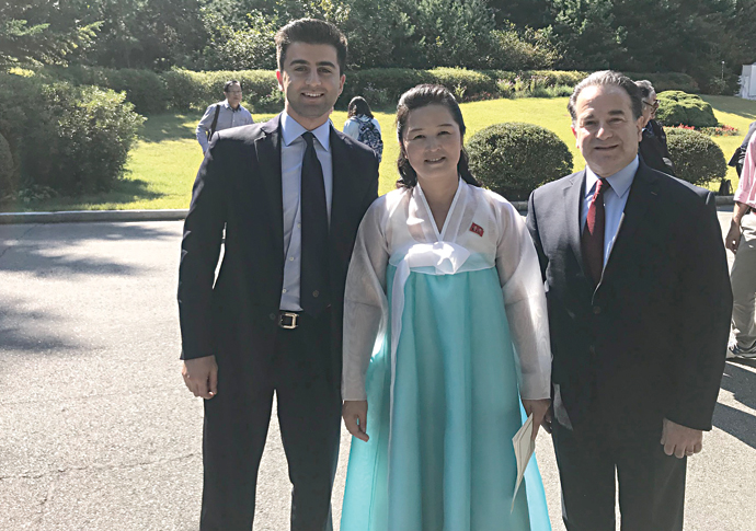 Nadey Hakim right with son David in North Korea