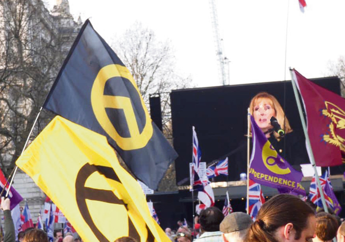 Platform for the far-right in Whitehall flag credit carol hedge