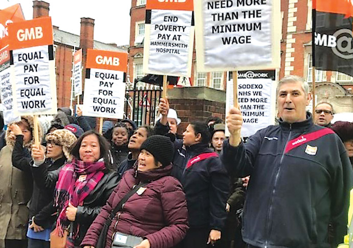 Private firm hospital workers walk out over Living Wage pay row Hammersmith hospital