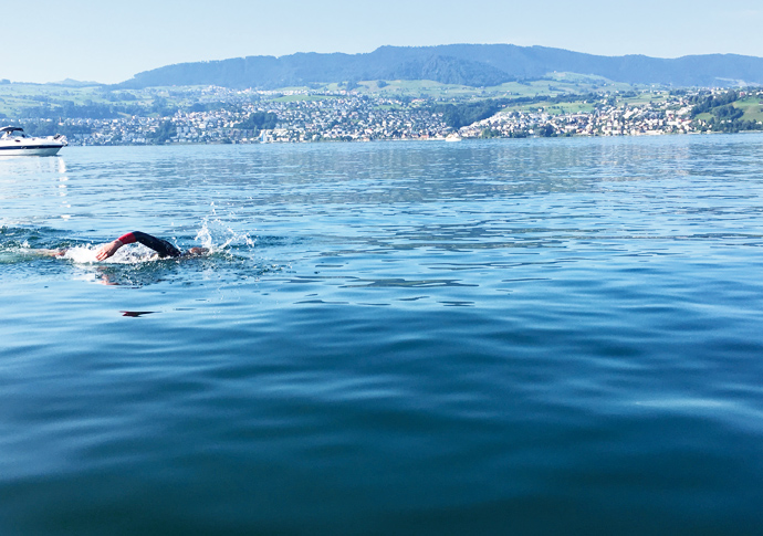 Swimmers take plunge in Swiss lake Zurich Swim-Action