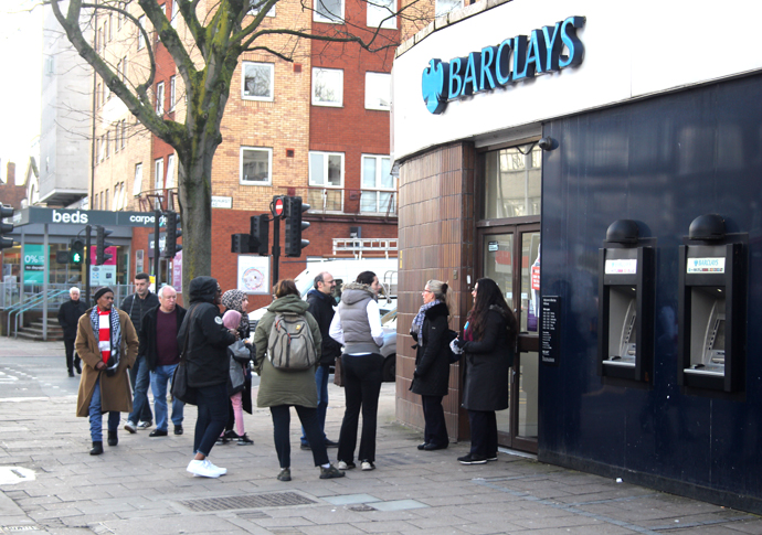Greenpeace locks out Barclays customers in fossil fuel protest Barclays