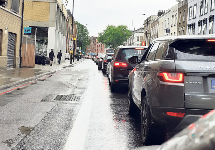 Impoverished? A friend tells me he spends £30 a week on his car Traffic jam