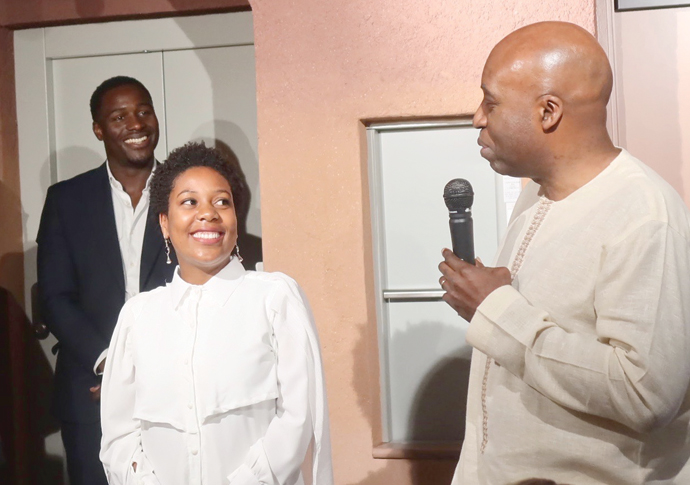 Africa Centre_Oba Nsugbe (r) introducing artist Sungi Mlengeya (middle) at launch
