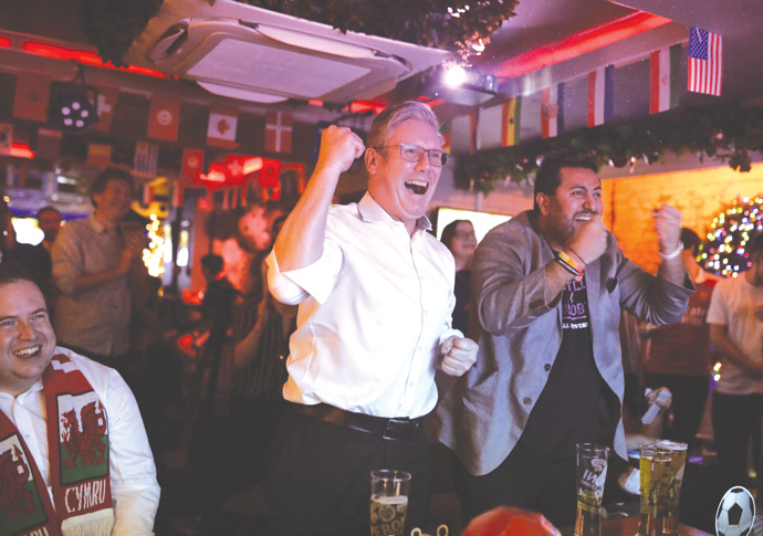 Keir Starmer and Rishi Madlani watchin England in World Cup