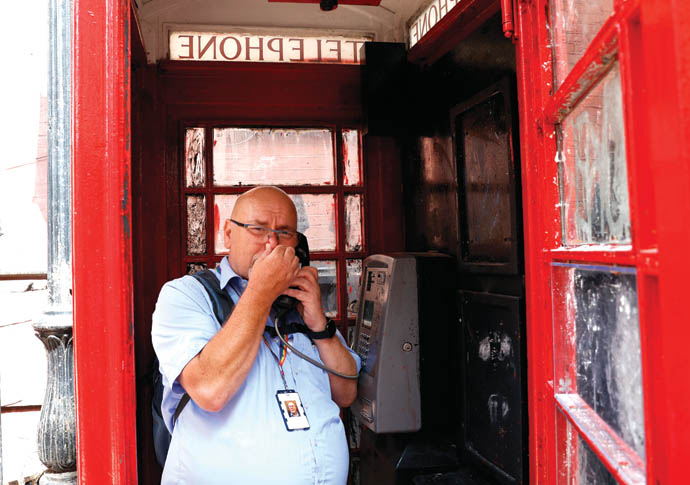 Patrick Lilley in a phone box_FMA_MYL_10432