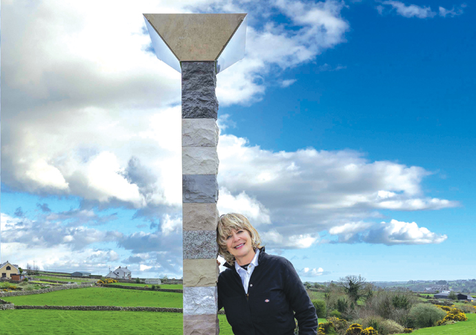 Angela Palmer with Tower of Time photo by Ewa McBride Photography