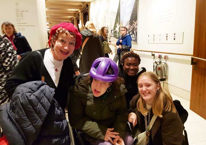 Ellie at the Royal Opera House with her mother and support workers