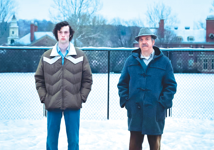 Dominic Sessa and Paul Giamatti in The Holdovers Photo Seacia Pavao-AP