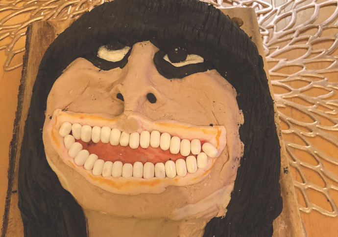 Harrington: Traitors host all smiles Claudia cake