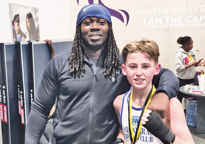 Seconds Out! Boxers start 2026 with a bang Paul Rattigan with St Pancras ABC coach Chudi Onwauzor-1