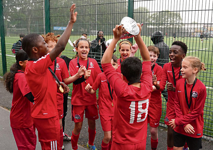 Elite aces prove a real knockout! Camden Elite U11s celebrating new